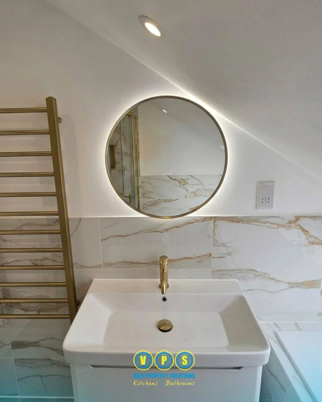 round mirror and sink