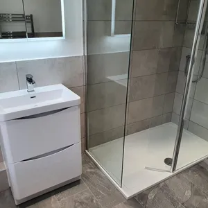 a bathroom with a sink and a shower